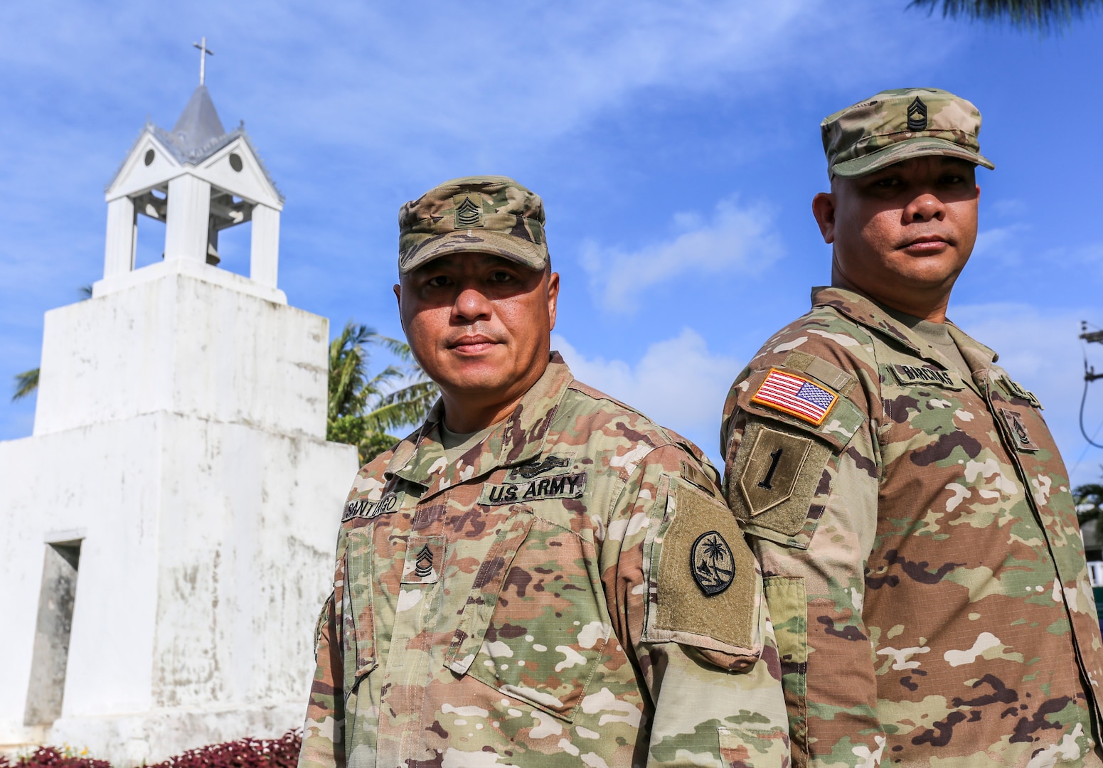 Brothers-in-law and Master Sgts. Joseph Santiago, left, and Andrew Barcinas, of the Guam National Guard, prepare for the Sergeants Major Academy in Merizo, Guam on May 15.