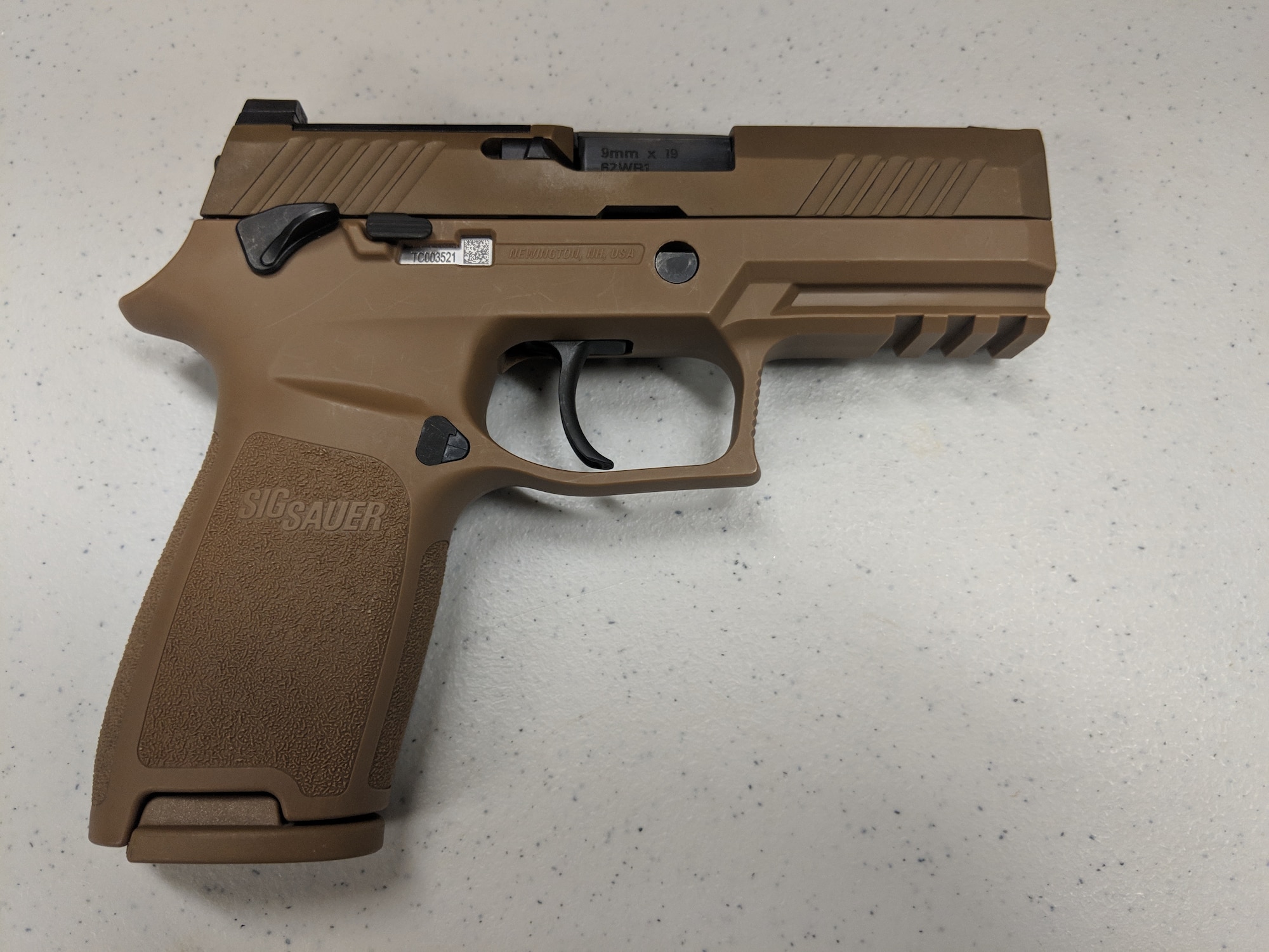 The Air Force Security Forces Center, in partnership with the Air Force Small Arms Program Office, has begun fielding the new M18 Modular Handgun System to Security Forces units. (U.S. Air Force photo by Vicki Stein)