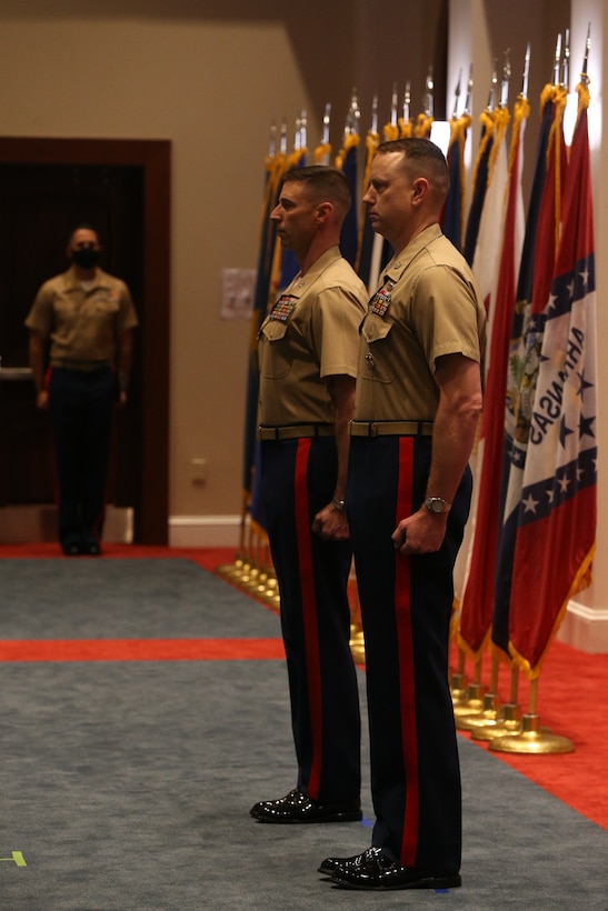 Colonel Donald J. Tomich, left, outgoing commanding officer, Marine Barracks Washington D.C., and Col. Teague A. Pastel, incoming commanding officer, Marine Barracks Washington D.C., stand at attention during a change of command ceremony at the Barracks, June 17, 2020. Colonel Donald J. Tomich relinquished his command of Marine Barracks Washington D.C. to Col. Teague A. Pastel. Pastel previously served as the Deputy Commandant for Information (DC I) where he served as the Director, Plans and Strategy Division.