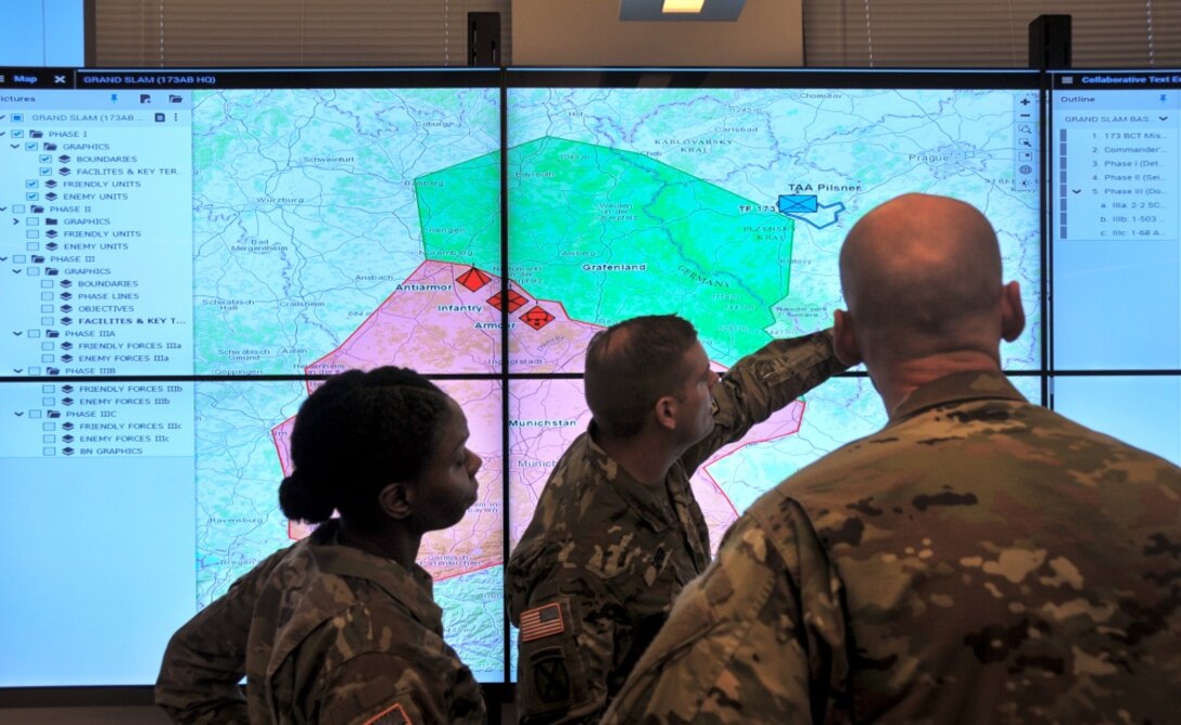 Soldiers demonstrate the Command Post Computing Environment prototype at Aberdeen Proving Ground in May. With a new single tactical server infrastructure plus a common software baseline, it will provide Soldiers an underlying core command post system that will accommodate additional warfighting functionality. Thurston and his Mission Command team established the architecture, system design and acquisition strategy for the Command Post Computing Environment and the Mounted Computing Environment. (U.S. Army photo by Dan Lafontaine, PEO C3T)