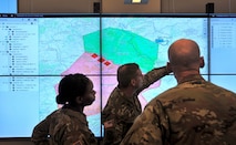 Soldiers demonstrate the Command Post Computing Environment prototype at Aberdeen Proving Ground in May. With a new single tactical server infrastructure plus a common software baseline, it will provide Soldiers an underlying core command post system that will accommodate additional warfighting functionality. Thurston and his Mission Command team established the architecture, system design and acquisition strategy for the Command Post Computing Environment and the Mounted Computing Environment. (U.S. Army photo by Dan Lafontaine, PEO C3T)