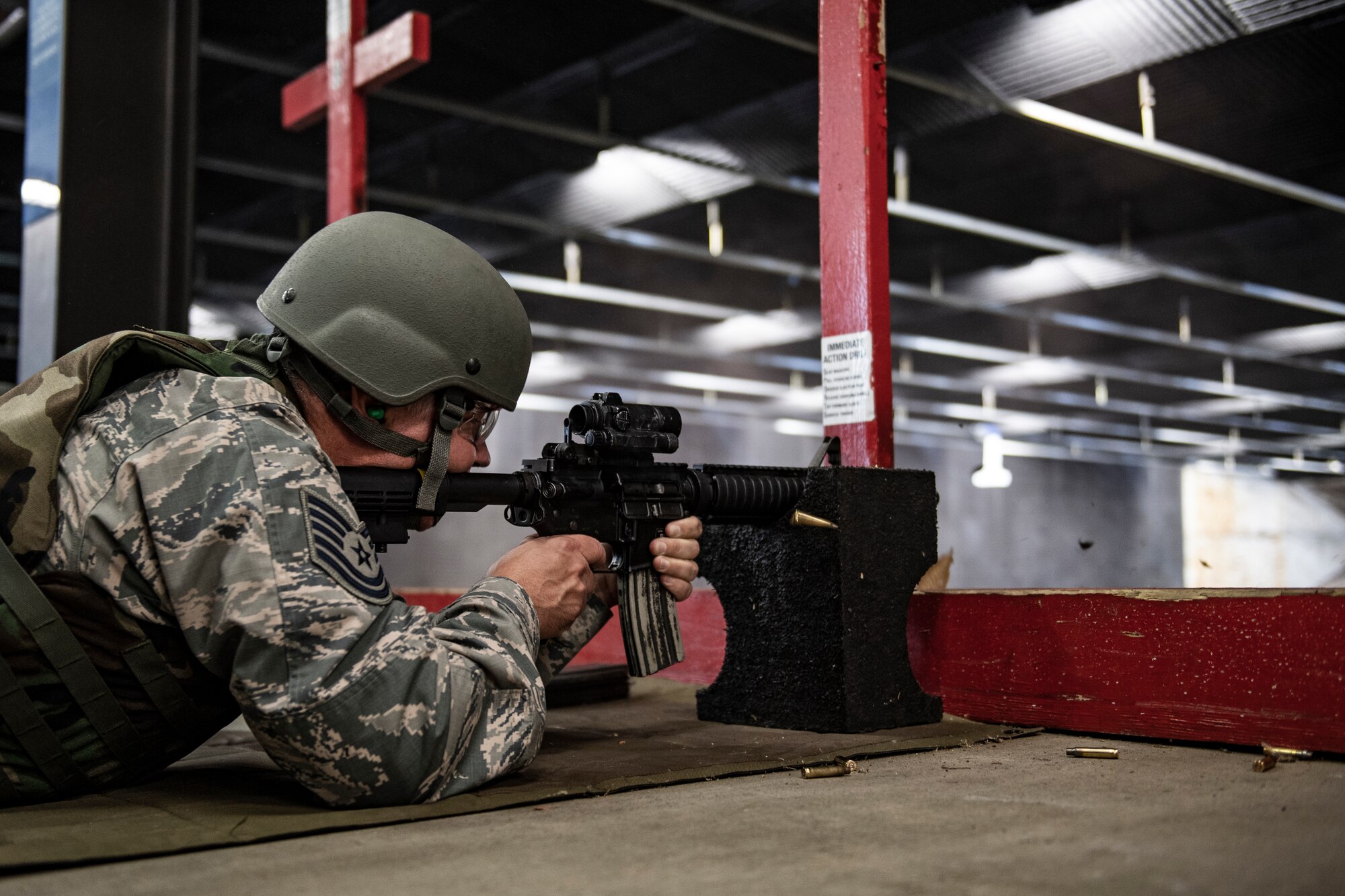 Tech. Sgt. Bradford Scott, 911th Airlift Wing religious affairs Airman, fires an M-4 during weapons qualification at the 911th AW firing range in Clinton, Pennsylvania, June 6, 2020.