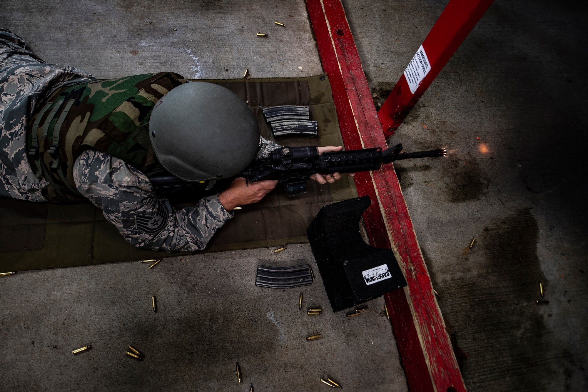 Tech. Sgt. Bradford Scott, 911th Airlift Wing religious affairs Airman, fires an M-4 during weapons qualification at the 911th AW firing range in Clinton, Pennsylvania, June 6, 2020.