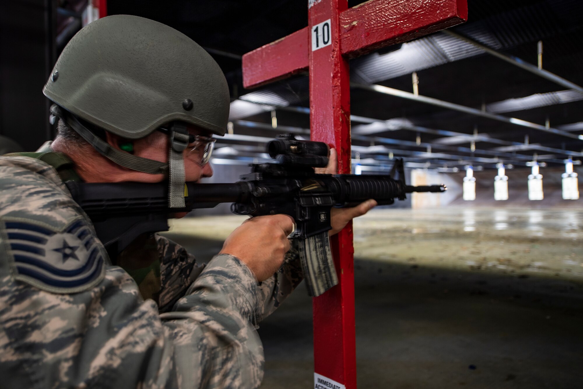 Tech. Sgt. Bradford Scott, 911th Airlift Wing religious affairs Airman, fires an M-4 during weapons qualification at the 911th AW firing range in Clinton, Pennsylvania, June 6, 2020.