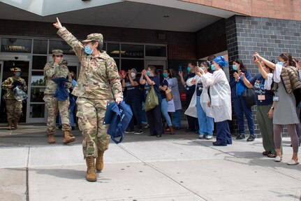 U.S. Army Soldiers, assigned to Joint Task Force New York, are thanked by medical staff during a farewell ceremony at Elmhurst Medical Center in Brooklyn June 3, 2020.