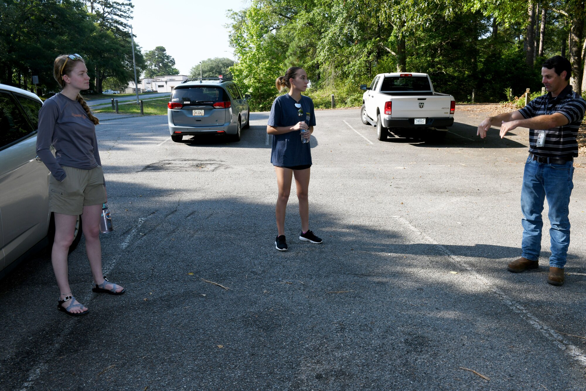 Three people standing