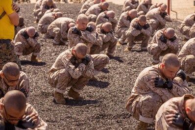 Recruits with Hotel Company, 2nd Recruit Training Battalion, conduct a back breakfall during a Marine Corps Martial Arts practice session at Marine Corps Recruit Depot, San Diego, June 15, 2020.