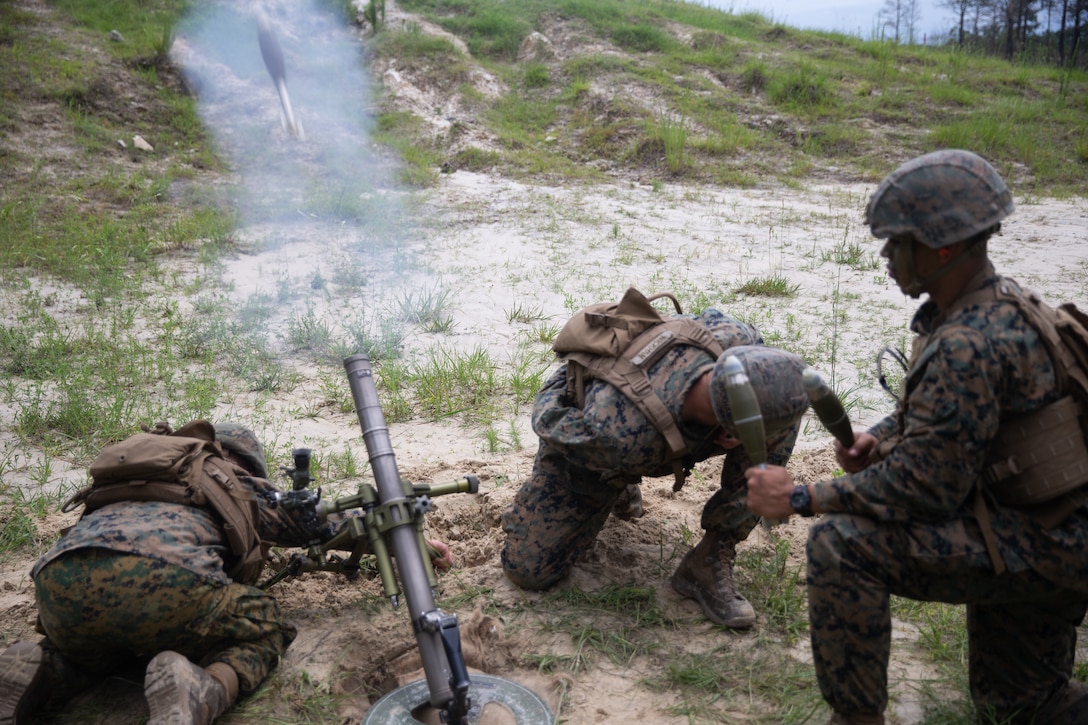 U.S. Marines fire high-explosive delay rounds as suppression and support during a fire and support range at Camp Lejeune, N.C., June 14.
