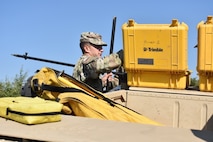 Spc. Charles Vincent prepares to assemble the mobile GNSS rovers, which are used to receive location and elevation coordinates from a satellite before transferring them to the stationary base receiver. The coordinate is then linked to the base receiver’s coordinates, averaged out, and sent back to the mobile rover. They are establishing the grade for a moving rail-target system at the non-standard live-fire range at Joint National Training Center, Cincu, Romania. This project is part of Resolute Castle 17, an operation to help build relationships with the NATO alliance and enhance its capacity for joint training and response to threats within the region.