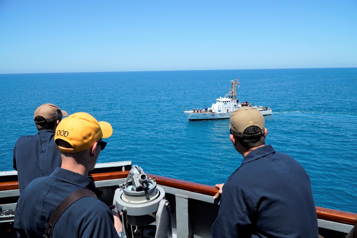 200622-N-NO901-0007 BLACK SEA (June 22, 2020) – Ensign Seamus Long (left), Lt.j.g. Joseph Minicucci (center), and Cmdr. Craig Trent observe USS Porter (DDG 78) and USS Oak Hill (LSD 51) execute maneuvering and air defense exercises with GCG Ochamchire (P-23) and GCG Dioskura (P-25) in the Black Sea, June 22, 2020. Porter, forward-deployed to Rota, Spain, is on its eighth patrol in the U.S. 6th Fleet area of operations in support of U.S. national security interests in Europe and Africa. (U.S. Navy photo by Interior Communication Electrician 2nd Class Jeffrey Abelon/Released)