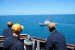 200622-N-NO901-0007 BLACK SEA (June 22, 2020) – Ensign Seamus Long (left), Lt.j.g. Joseph Minicucci (center), and Cmdr. Craig Trent observe USS Porter (DDG 78) and USS Oak Hill (LSD 51) execute maneuvering and air defense exercises with GCG Ochamchire (P-23) and GCG Dioskura (P-25) in the Black Sea, June 22, 2020. Porter, forward-deployed to Rota, Spain, is on its eighth patrol in the U.S. 6th Fleet area of operations in support of U.S. national security interests in Europe and Africa. (U.S. Navy photo by Interior Communication Electrician 2nd Class Jeffrey Abelon/Released)
