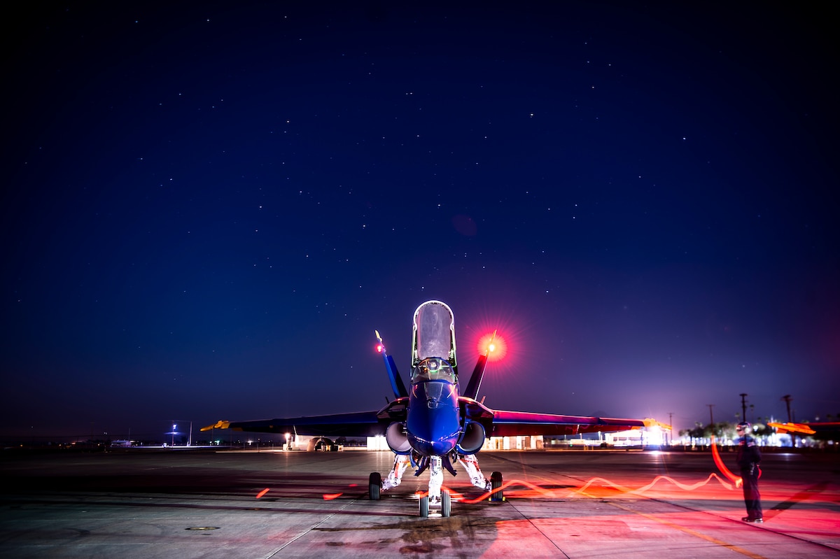 Members of the U.S. Navy Flight Demonstration Squadron, the Blue Angels, perform morning turn-up operations at Naval Air Facility El Centro, California.