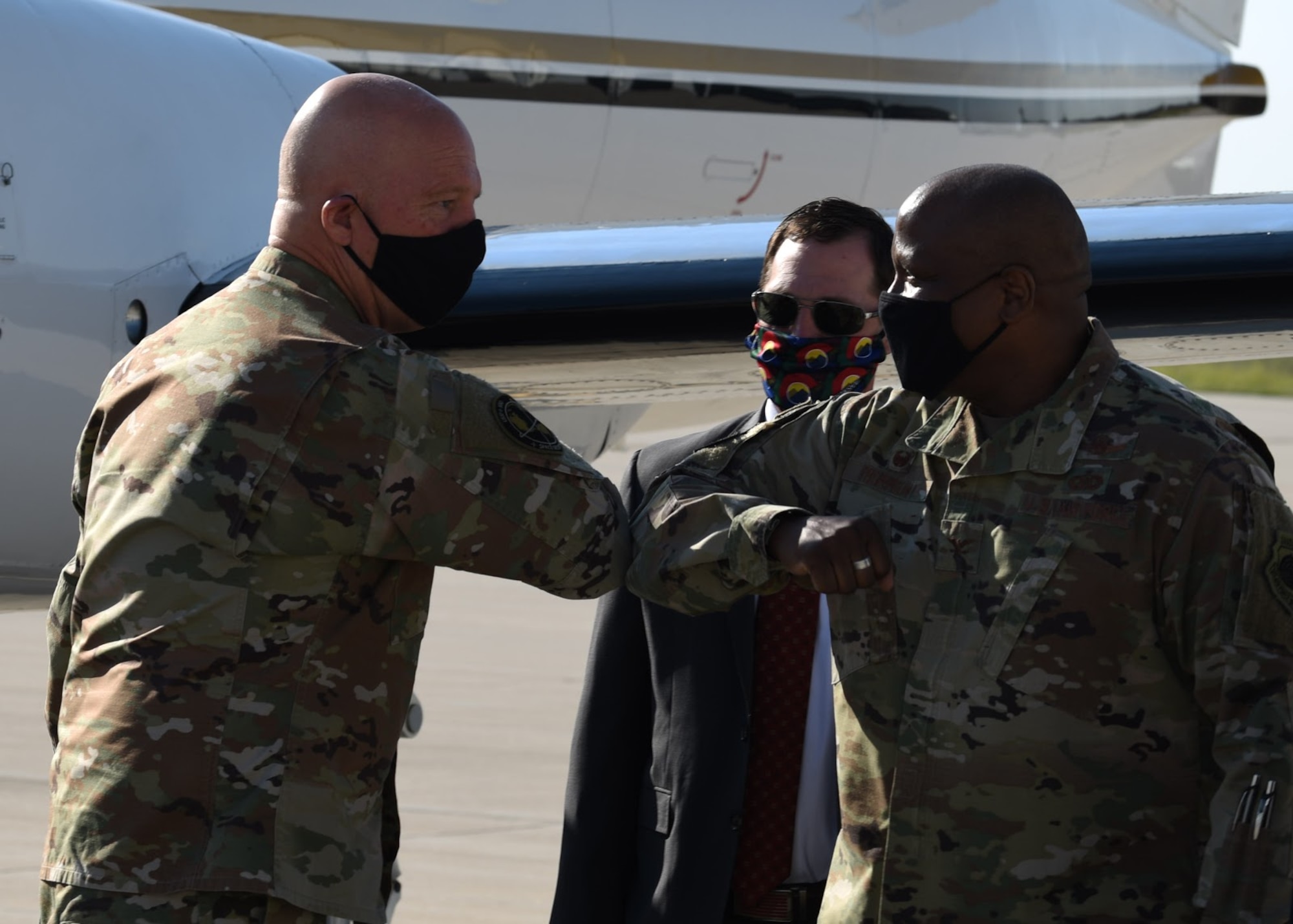 Col. Devin Pepper, 460th Space Wing commander, greets Gen. Jay Raymond, United States Space Force Chief of Space Operations and United States Space Command commander, outside Hangar 909 at Buckley Air Force Base, Colo., June 17, 2020. Raymond visited Buckley Air Force Base to recognize Team Buckley’s outstanding performers. (U.S. Air Force photo by Airman 1st Class Haley N. Blevins)