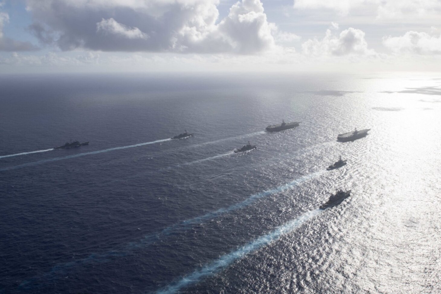 PHILIPPINE SEA (June 23, 2020) The Theodore Roosevelt Carrier Strike Group transits in formation with the Nimitz Carrier Strike Group while conducting dual carrier and airwing operations in the Philippine Sea June 23, 2020. Dual carrier operations unify the tactical power of two individual carrier strike groups, providing fleet commanders with an unmatched, unified credible combat force capable of operating indefinitely. The Nimitz and Theodore Roosevelt carrier strike groups are on scheduled deployments to the Indo-Pacific.
