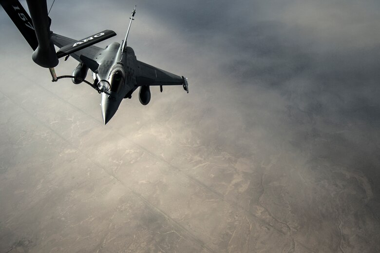 U.S. Air Force Airmen from the 340th Expeditionary Air Refueling Squadron refuel a French F-2 Rafale over Iraq in support of Operation Inherent Resolve, Jan. 8, 2016.