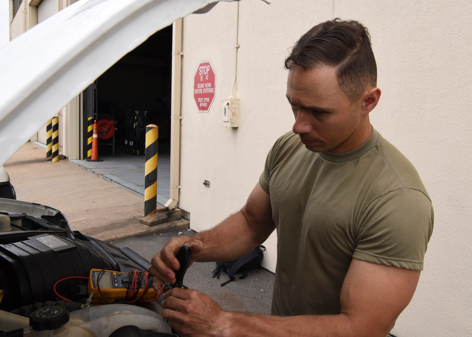Tech. Sgt. John Bishop, 8th Logistics Readiness Squadron NCO in charge of vehicle maintenance, inspects a vehicle at Kunsan Air Base, Republic of Korea, June 4, 2020. The unit helps maintain 485 vehicles across the Wolf Pack. (U.S. Air Force photo by Staff Sgt. Anthony Hetlage)