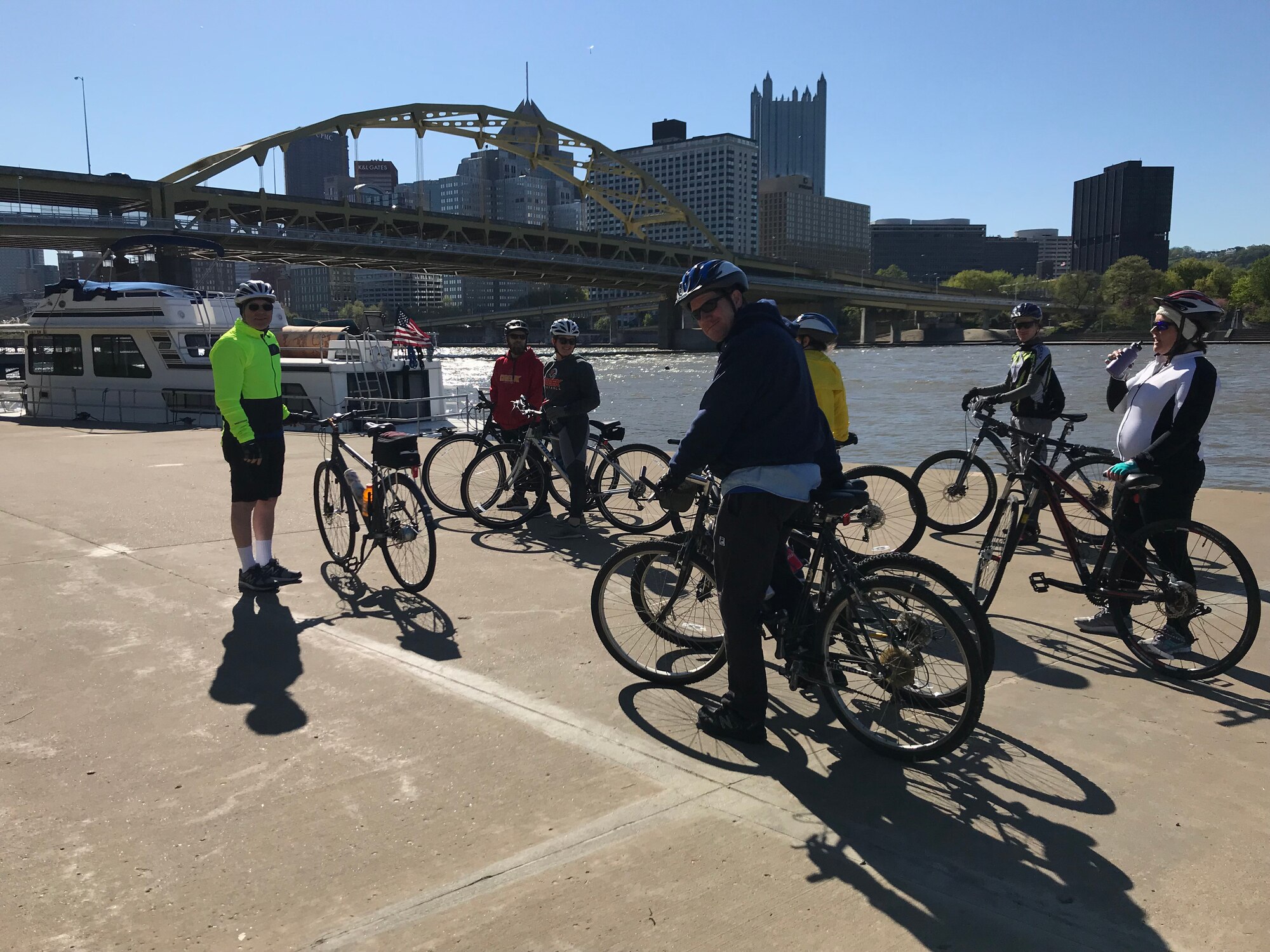 Veterans and military members take a break from riding bikes on the Riverfront Trail in Pittsburgh, Pennsylvania, April 27, 2019.