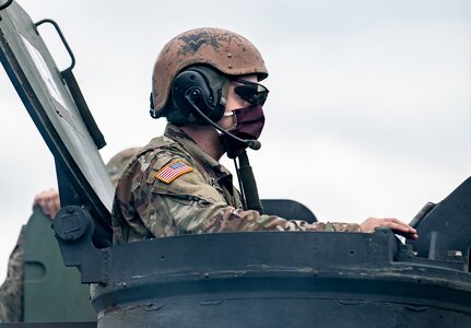 A crew member of the West Virginia National Guard’s 1st Battalion, 201st Field Artillery (FA), in an M109 A6 Paladin Self-Propelled Howitzer at Camp Dawson, Kingwood, West Virginia, June 14, 2020. The 201st FA is conducting Field Artillery Tables 1-5 pre-certification qualifications.