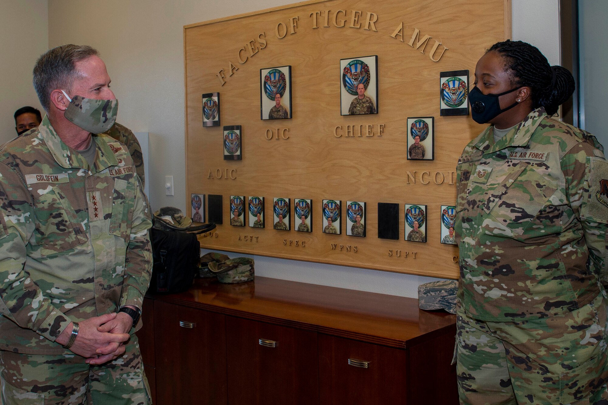 Air Force Chief of Staff Gen. David L. Goldfein speaks with an Airmen at Creech Air Force Base