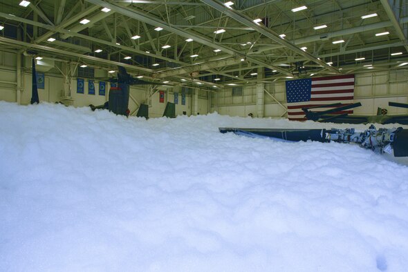 White foam filling an aircraft hangar