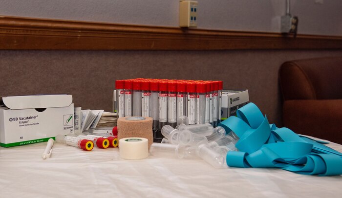 Medical supplies sit on table.