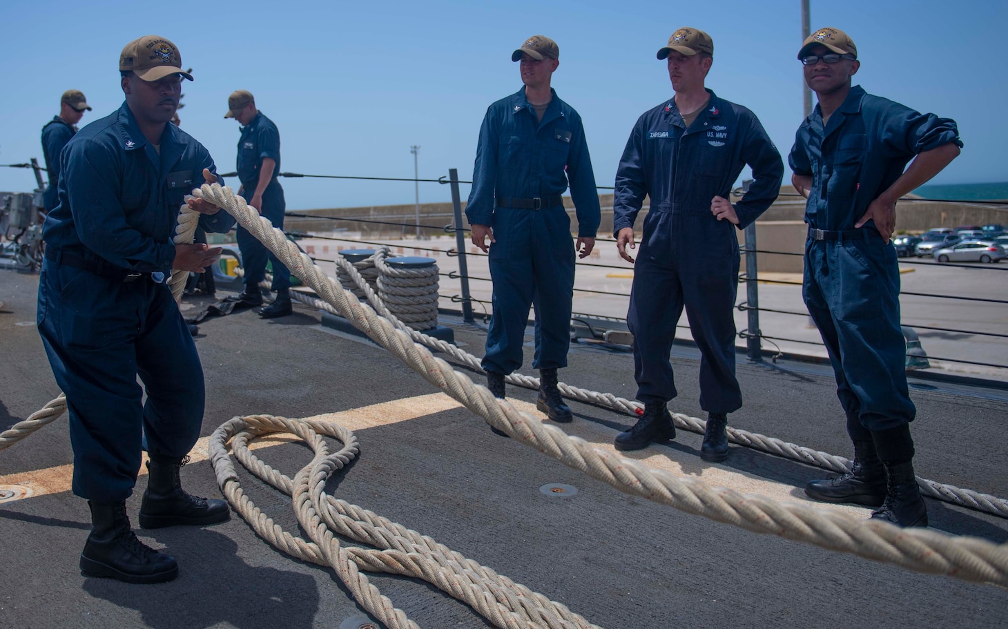 200623-N-KY668-1026 NAVAL STATION ROTA, Spain (June 23, 2020) Information System Technician 3rd Class Anthony D. Stewart heaves around a line on the foc’s’le aboard the Arleigh Burke-class guided-missile destroyer USS Roosevelt (DDG 80), June 23, 2020. Roosevelt, forward-deployed to Rota, Spain, is on its first patrol in the U.S. 6th Fleet area of operations in support of regional allies and partners and U.S. national security interests in Europe and Africa. (U.S. Navy photo by Mass Communication Specialist Seaman Austin G. Collins/Released)