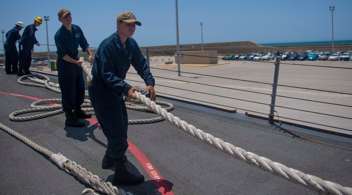 200623-N-KY668-1040 NAVAL STATION ROTA, Spain (June 23, 2020) Boatswain's Mate Seaman Michelle A. Bonner heaves around a line on the foc’s’le aboard the Arleigh Burke-class guided-missile destroyer USS Roosevelt (DDG 80), June 23, 2020. Roosevelt, forward-deployed to Rota, Spain, is on its first patrol in the U.S. 6th Fleet area of operations in support of regional allies and partners and U.S. national security interests in Europe and Africa. (U.S. Navy photo by Mass Communication Specialist Seaman Austin G. Collins/Released)