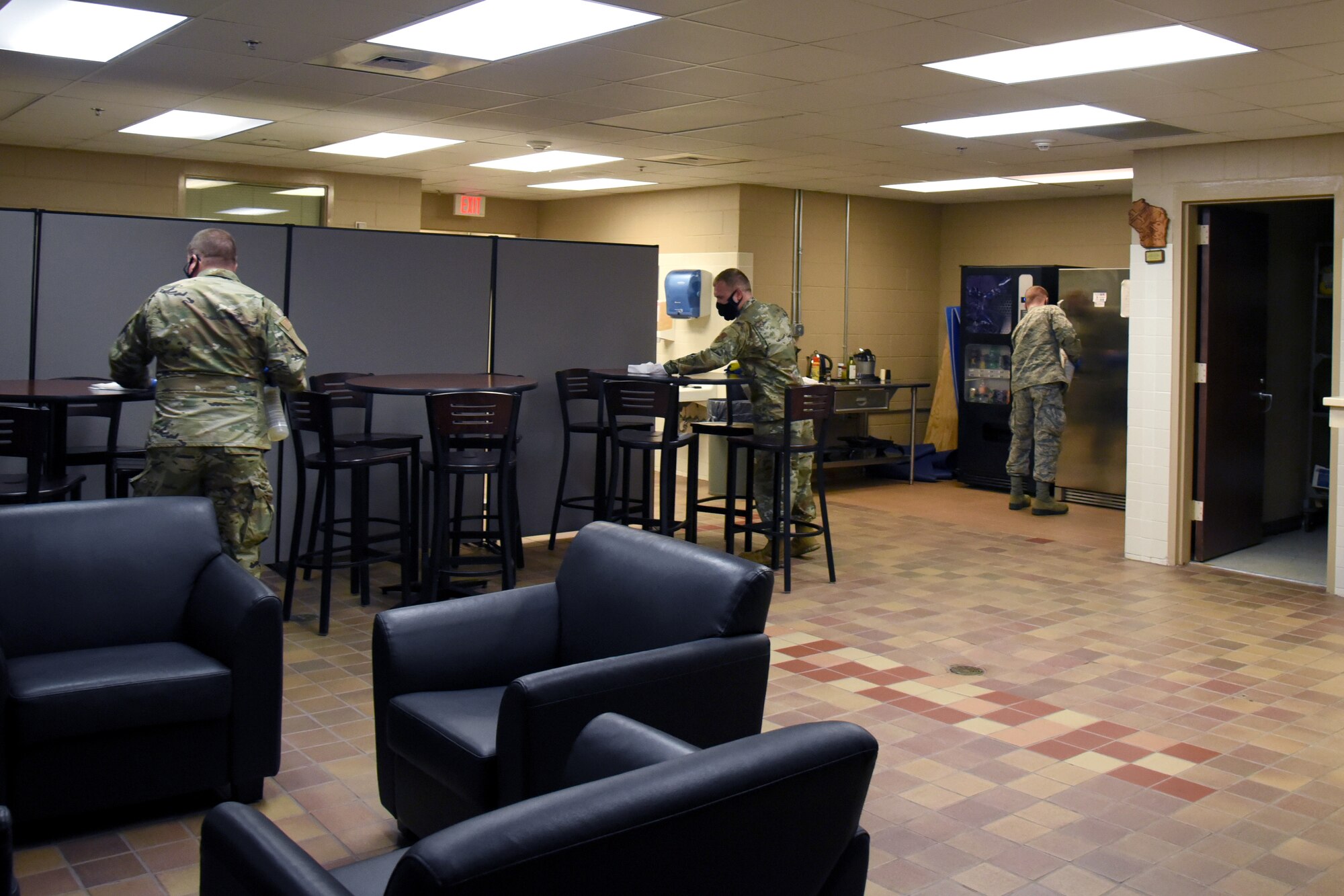 Georgia Air National Guardsmen assigned to the 117th Air Control Squadron disinfect frequently used areas on the installation at the 117th Air Control Squadron at Hunter Army Airfield, June 16, 2020.  The base infection control teams minimize the potential spread of COVID-19 for unit members by disinfecting common areas and workplaces as a precautionary measure. (U.S. Air National Guard photo by Staff Sgt. Jamila Haven)