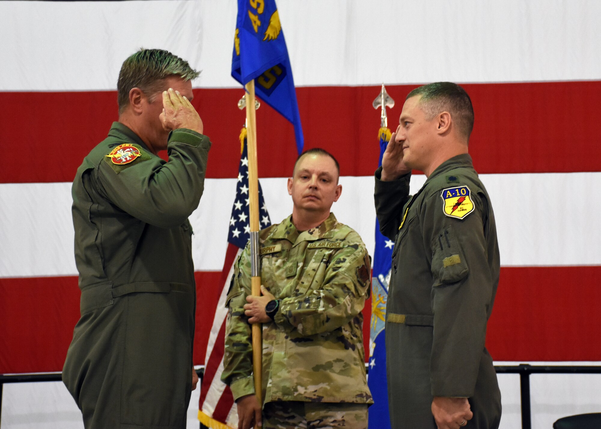 Lt. Col. Aaron Palan Salutes Col. Stephen Nester after accepting command of the 358th Fighter Squadron.