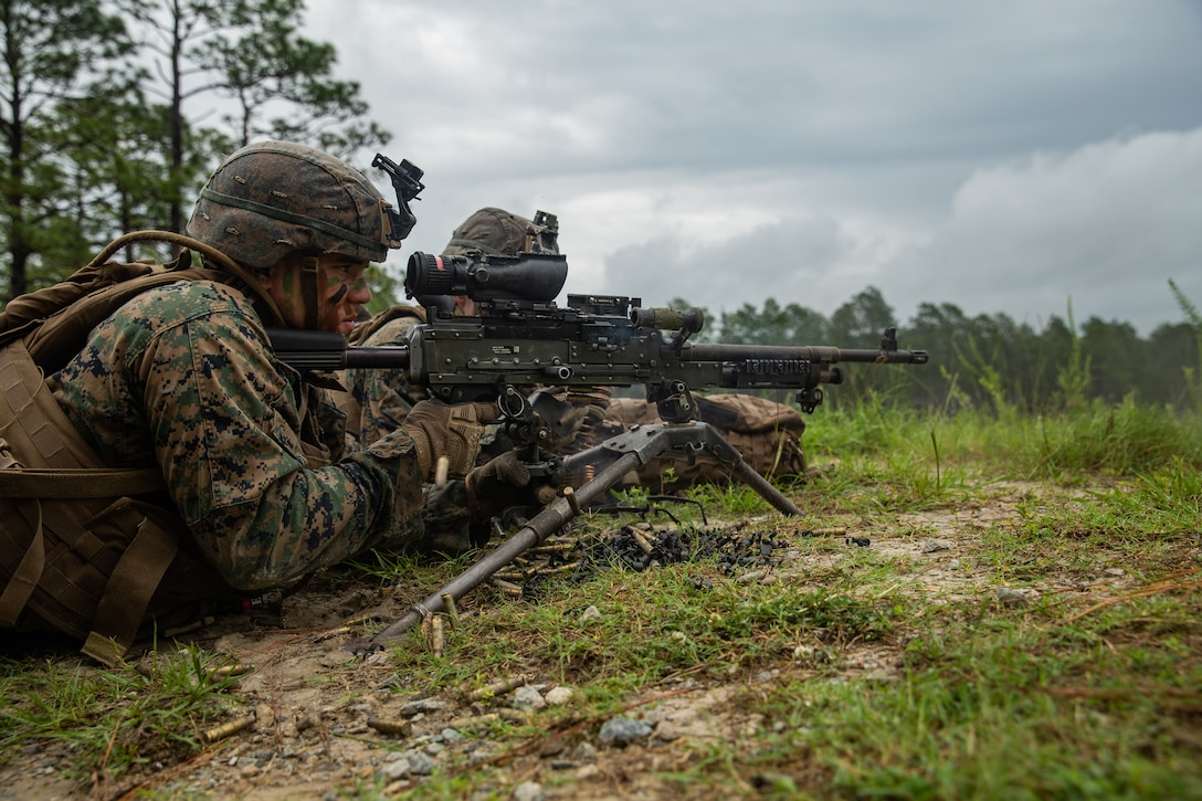 A U.S. Marine provides suppression using an M240 during a fire and support range at Camp Lejeune, N.C., June 13.