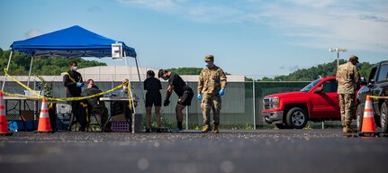 The West Virginia National Guard's Chemical, Biological, Radiological, Nuclear and Explosive (CBRNE) Battalion, the 35th Civil Support Team (CST), and the 35th Enhanced Response Force Package (CERFP), which make up Task Force CRE, collaborated with Task Force Medical to help state agencies with COVID-19 testing May 22, 2020, in Charleston.