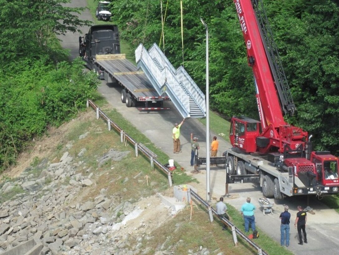 A galvanized staircase was installed at Pittsburgh District USACE Shenango River Lake outflow June 19, 2020 to improve access to the shoreline downstream of the dam. Anglers now have an easier and safer path to their favorite fishing spots.