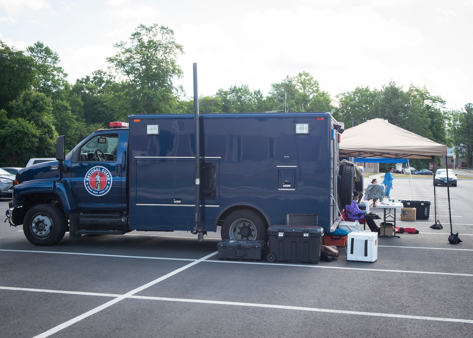 Analytical Laboratory System vehicles from the Connecticut National Guard 14th Civil Support Team and New York National Guard 24th Civil Support Team are parked at Bradley Air National Guard Base, East Granby, Connecticut, June 19, 2020. The civil support teams worked in partnership with the 103rd Medical Group and Connecticut Department of Public Health to provide COVID-19 testing to Connecticut Air National Guard personnel. (U.S. Air National Guard photo by Staff Sgt. Steven Tucker)