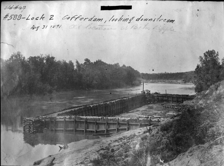 This is the coffer dam at the Lock 2 “Becks Ripple” location on the Cumberland River in Nashville, Tennessee, Aug. 31, 1891. Excavation at the site would reveal that suitable bedrock foundation at “Becks Ripple” did not exist at a consistent depth, which led to the selection of a new site location 1.5 miles downstream. (USACE Photo)