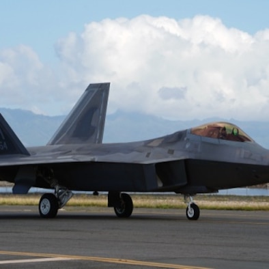 A F-22 Falcon tactical aircraft sits on the flightline on Joint Base Pearl Harbor-Hickam, Hawaii, Apr. 21, 2020. The F-22 has been around since 2005, helping maintain air dominance through impressive stealth, agility, and tactical aptitude. (U.S. Air Force photo by Airman 1st Class Erin Baxter)
