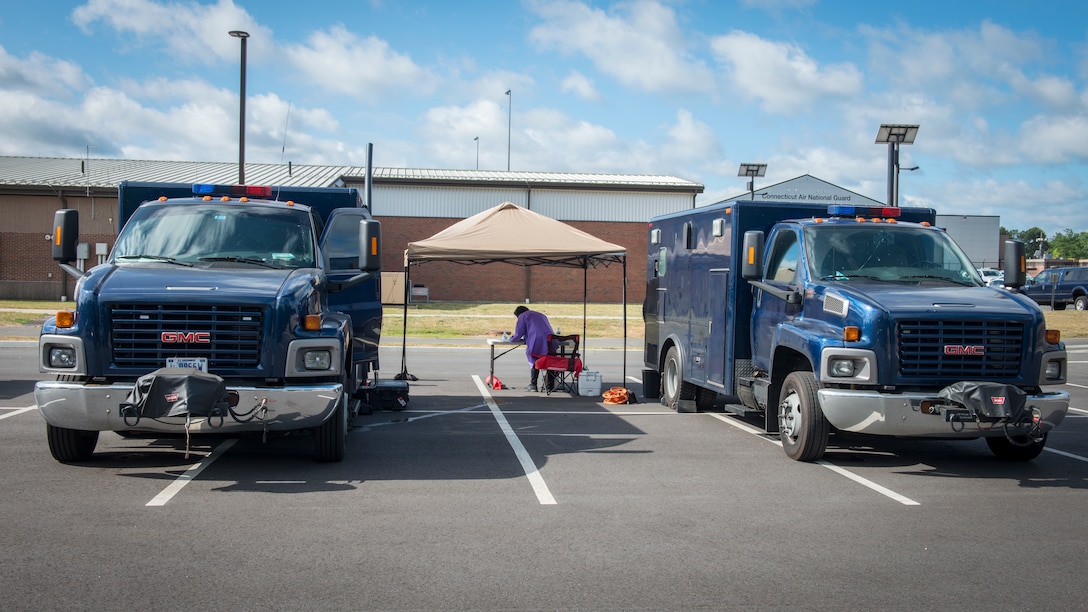 Analytical Laboratory System vehicles from the Connecticut National Guard 14th Civil Support Team and New York National Guard 24th Civil Support Team are parked at Bradley Air National Guard Base, East Granby, Connecticut, June 19, 2020. The civil support teams worked in partnership with the 103rd Medical Group and Connecticut Department of Public Health to provide COVID-19 testing to Connecticut Air National Guard personnel. (U.S. Air National Guard photo by Staff Sgt. Steven Tucker)