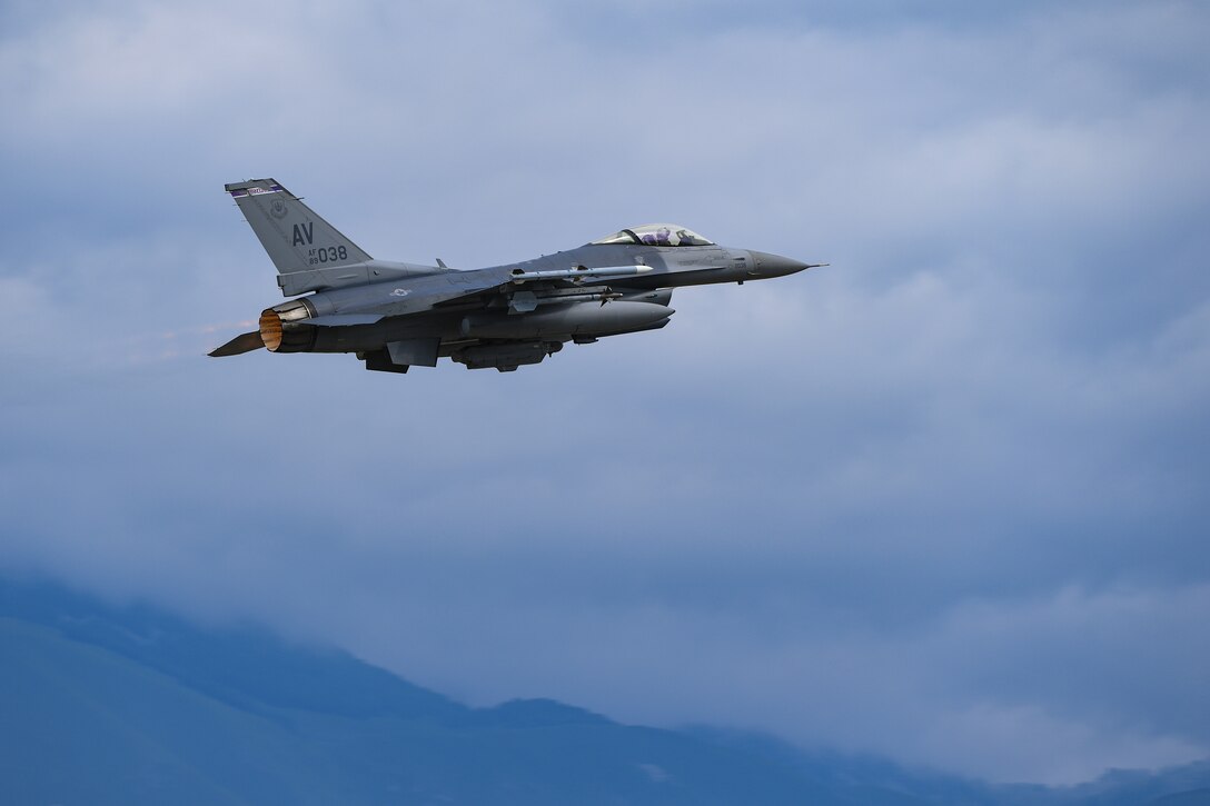 A U.S. Air Force F-16 Fighting Falcon from the 510th Fighter Squadron ascends at Aviano Air Base, Italy, June 25, 2020. The F-16 is able to fly more than 500 miles, deliver its weapons with superior accuracy, defend itself against enemy aircraft, and return to its starting point. (U.S. Air Force photo by Airman 1st Class Thomas S. Keisler IV)