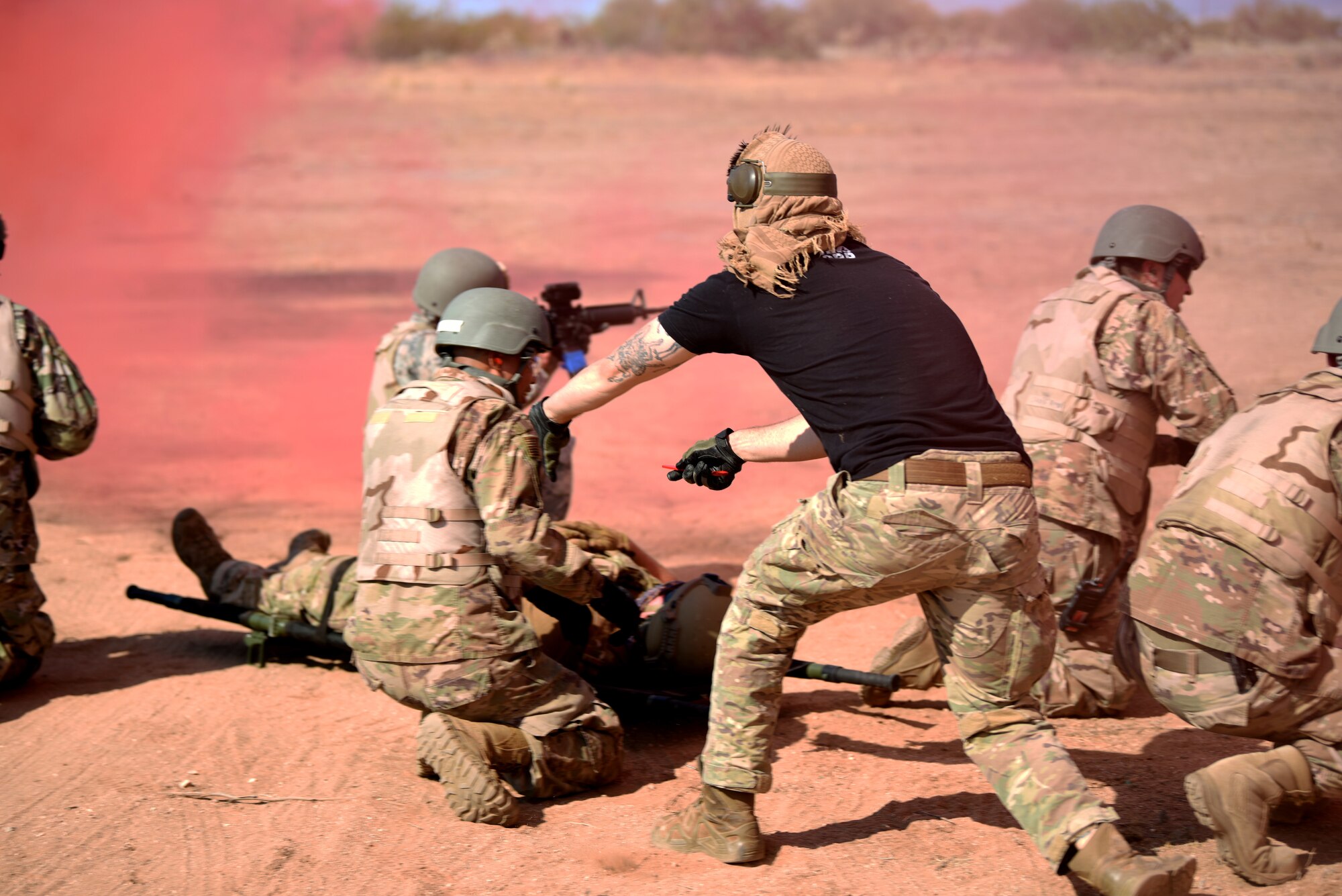 A simulated adversary ambushes Air Force Airmen during a training scenario