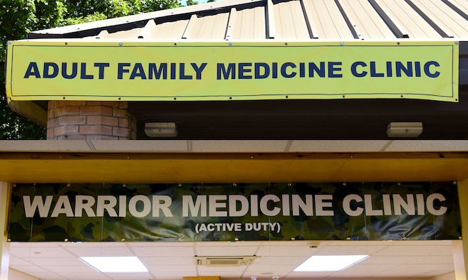 Banners representing two new 48th Medical Group clinics are displayed at Royal Air Force Lakenheath, England, June 25, 2020. Due to the group’s recent squadron reorganization, Adult Family Medicine Clinic providers will now exclusively treat non-active duty patients, expediting care for military members at the Warrior Medicine Clinic. (U.S. Air Force photo illustration by A1C Rhonda Smith)