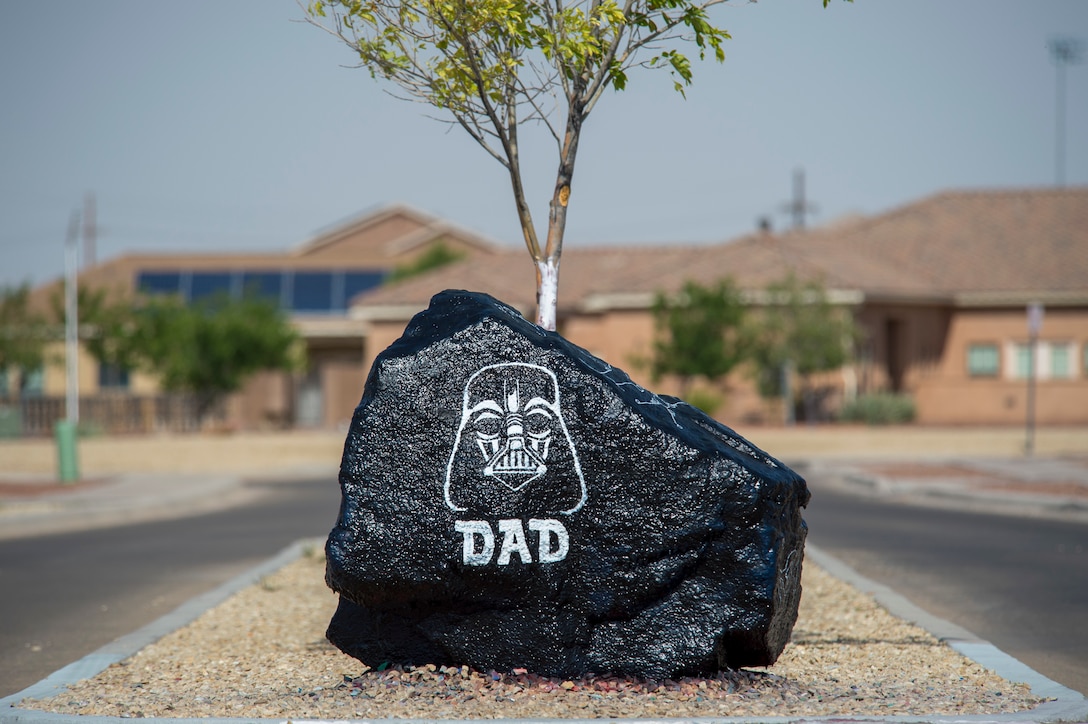 The “Holloman rock,” displays at base housing, June 23, 2020, on Holloman Air Force Base, N.M. In honor of Father’s Day, the rock was decorated with a design that featured a famous “movie star” dad, Darth Vader. (U.S. Air Force photo by Senior Airman Collette Brooks)