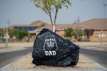 The “Holloman rock,” displays at base housing, June 23, 2020, on Holloman Air Force Base, N.M. In honor of Father’s Day, the rock was decorated with a design that featured a famous “movie star” dad, Darth Vader. (U.S. Air Force photo by Senior Airman Collette Brooks)