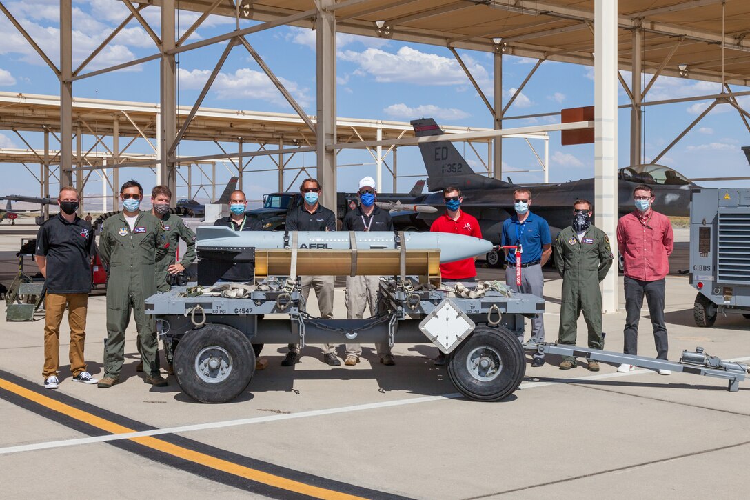 Members from the Gray Wolf test team and 416th Flight Test Squadron, pose for a photo following a captive-carry flight test of the Gray Wolf cruise missile prototype at Edwards Air Force Base, California, June 9. (Air Force photo by Kyle Brazier)