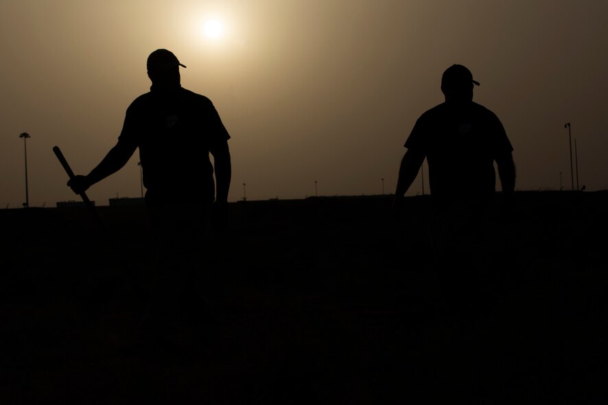 MWD handlers walk away after planting simulated IEDs