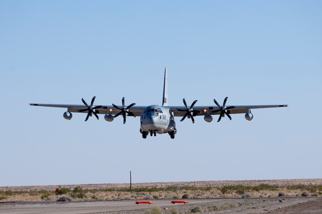 A U.S. Marine Corps KC-130J Hercules aircraft with Marine Aerial Refueler Transport Squadron (VMGR) 352 conducts a touch and go exercise at Auxiliary Airfield II aboard Marine Corps Air Station (MCAS) Yuma training ground on June 9, 2020. VMGR-352 is stationed out of Marine Corps Air Station Miramar.