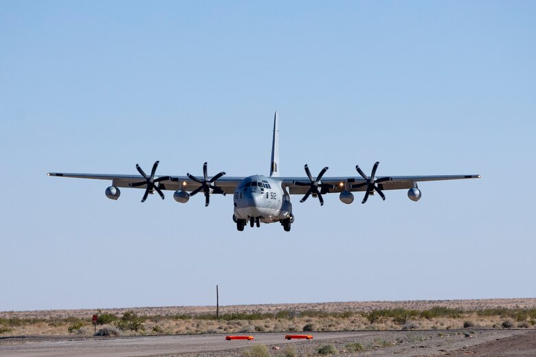 A U.S. Marine Corps KC-130J Hercules aircraft with Marine Aerial Refueler Transport Squadron (VMGR) 352 conducts a touch and go exercise at Auxiliary Airfield II aboard Marine Corps Air Station (MCAS) Yuma training ground on June 9, 2020. VMGR-352 is stationed out of Marine Corps Air Station Miramar. (U.S. Marine Corps photo by LCpl Gabrielle Sanders)