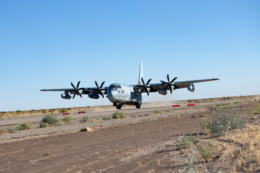 A U.S. Marine Corps KC-130J Hercules aircraft with Marine Aerial Refueler Transport Squadron (VMGR) 352 conducts a touch and go exercise at Auxiliary Airfield II aboard Marine Corps Air Station (MCAS) Yuma training ground on June 9, 2020. VMGR-352 is stationed out of Marine Corps Air Station Miramar.