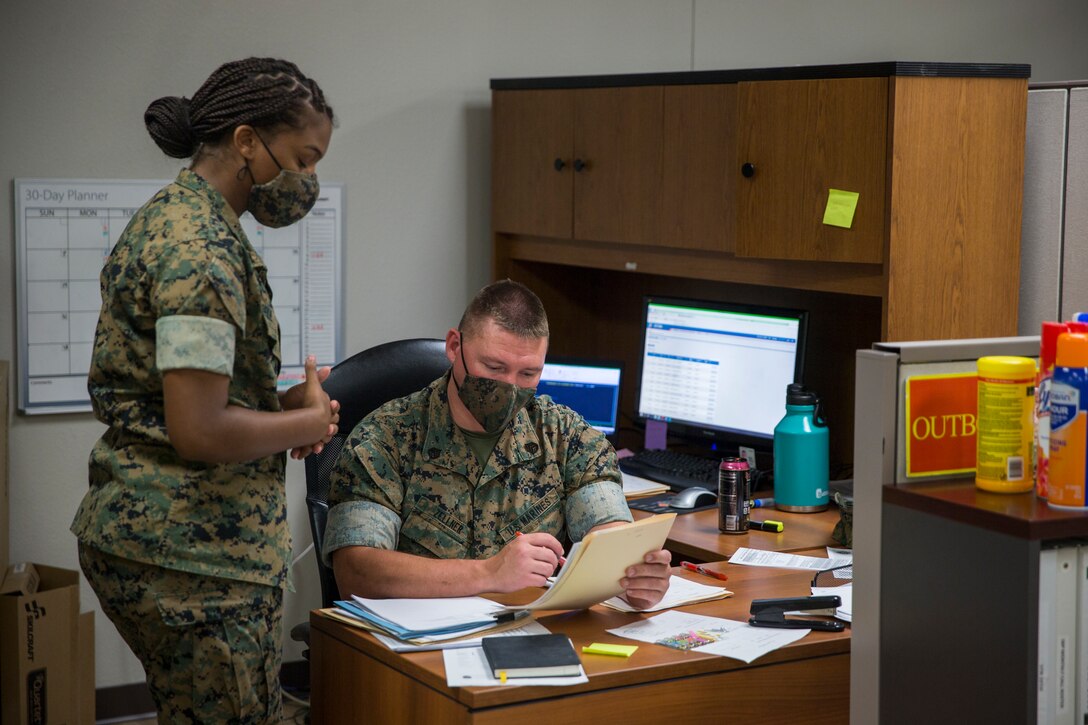 U.S. Marines with Installation Personnel Admin Center (IPAC), Marine Corps Air Station (MCAS) Yuma, conduct their daily routine on MCAS Yuma, June 10, 2020. IPAC handles all administrative services to Marines and their family members assigned to MCAS Yuma. (U.S. Marine Corps photo by Lance Cpl John Hall)