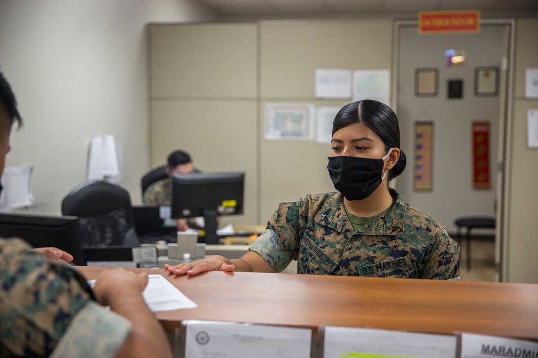 U.S. Marine Corps Cpl. Vanessa HernandezLopez, an administrative specialist with Installation Personnel Admin Center (IPAC), Marine Corps Air Station (MCAS) Yuma, inputs information during her daily routine on MCAS Yuma, June 10, 2020.