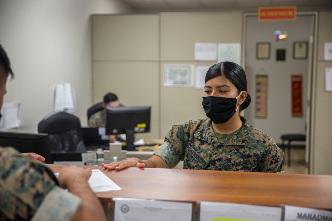 U.S. Marine Corps Cpl. Vanessa HernandezLopez, an administrative specialist with Installation Personnel Admin Center (IPAC), Marine Corps Air Station (MCAS) Yuma, inputs information during her daily routine on MCAS Yuma, June 10, 2020. IPAC handles all administrative services to all Marines and their family members assigned to MCAS Yuma. (U.S. Marine Corps photo by Lance Cpl John Hall)