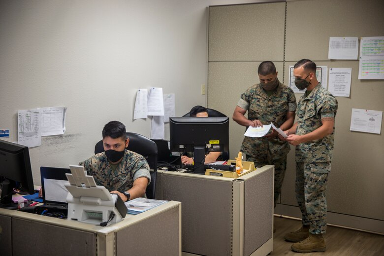 U.S. Marines with Installation Personnel Admin Center (IPAC), Marine Corps Air Station (MCAS) Yuma, conduct their daily routine on MCAS Yuma, June 10, 2020. IPAC handles all administrative services to all Marines and their family members assigned to MCAS Yuma. (U.S. Marine Corps photo by Lance Cpl John Hall)